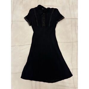 Elegant Black Dress with Lace Trim